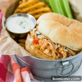 Crockpot buffalo chicken sandwich with blue cheese.