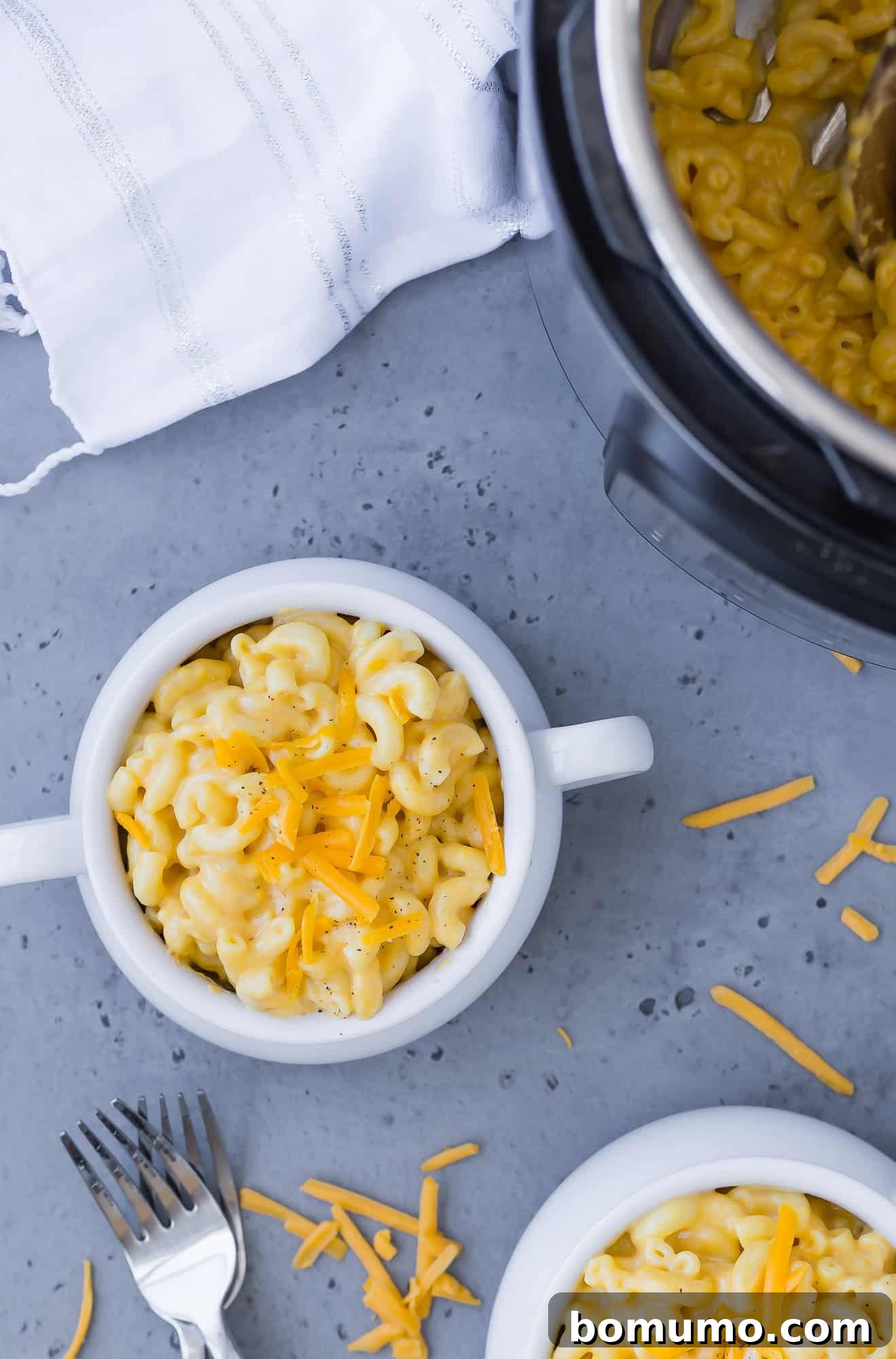 Overhead view of macaroni and cheese in a white bowl.
