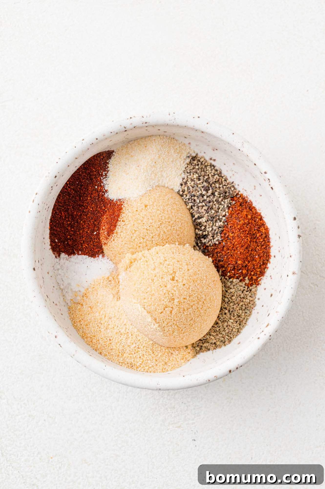 Instant Pot Ribs: Quick & Delicious 4 Spice rub ingredients before mixing together.