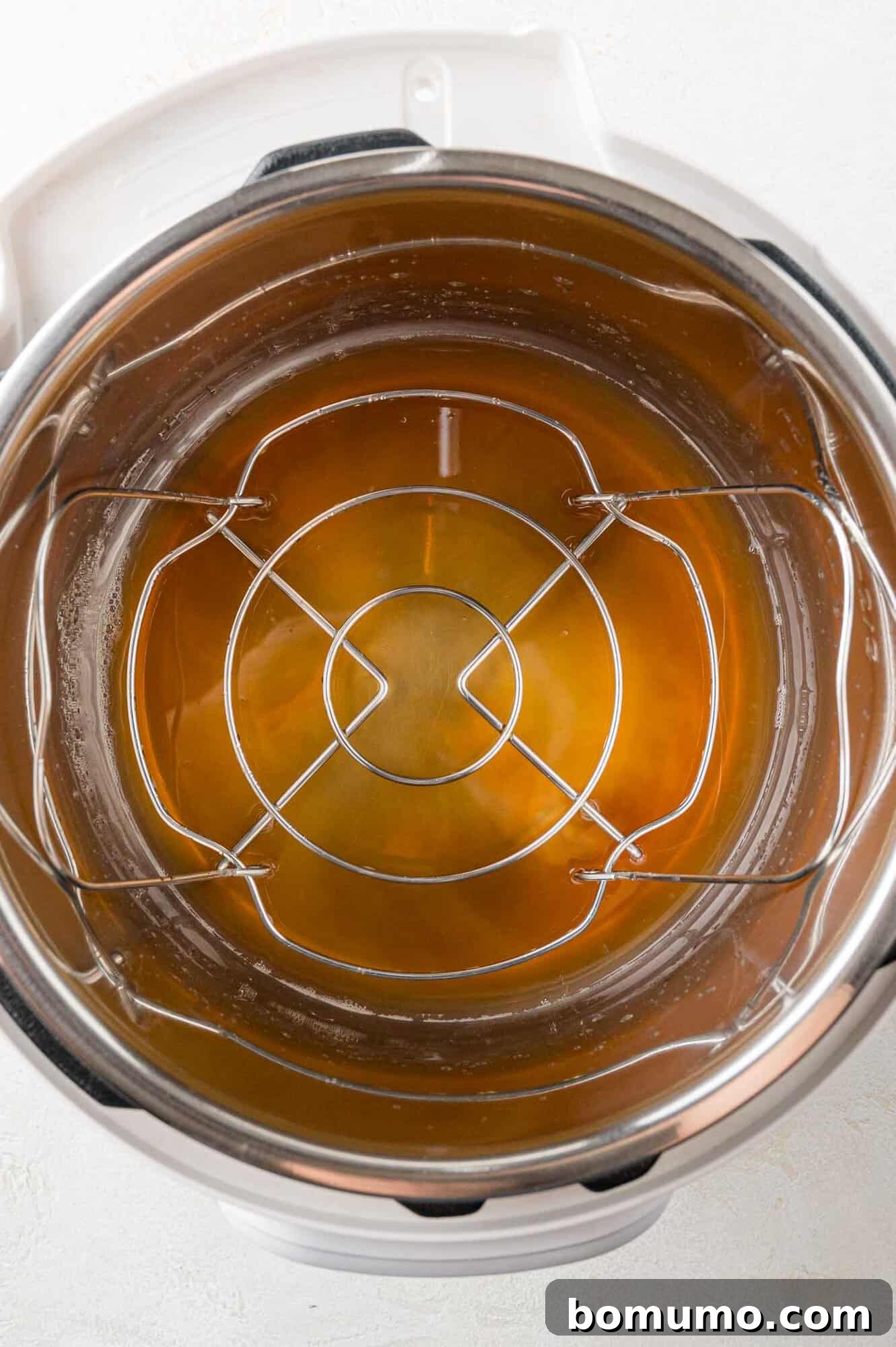 Instant Pot Ribs: Quick & Delicious 6 Liquid ingredients in the bottom of the Instant Pot.