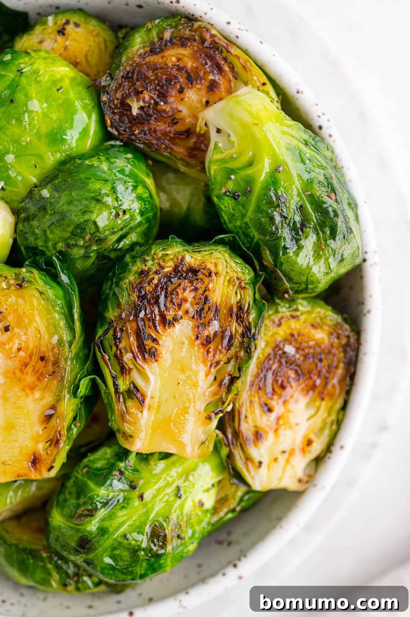 Cooked Brussels sprouts in a bowl.