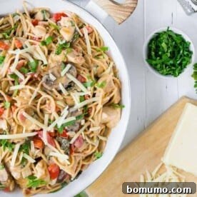 This creamy chicken spaghetti is made in one pan and is endlessly versatile. It's a great clean-out-the-fridge meal! 