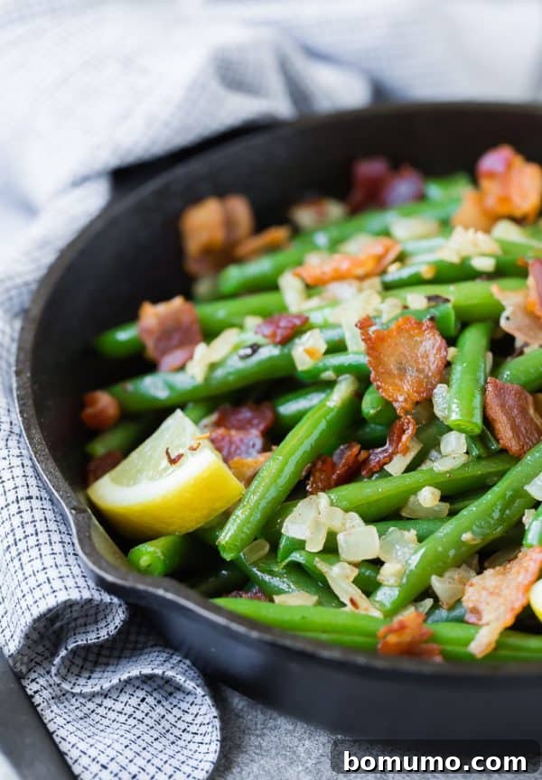 A match made in heaven, these green beans with bacon are completely irresistible. They very well might be your new favorite green bean recipe! 