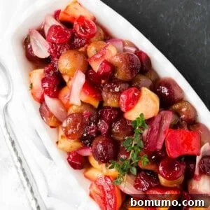 Cranberry sauce with roasted grapes and shallots, shown in a square format for recipe card.