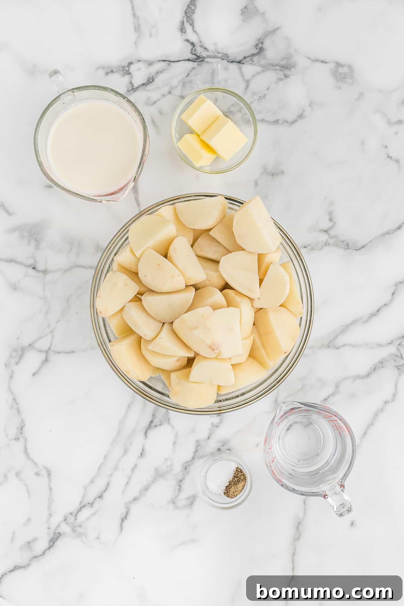 Key ingredients for mashed potatoes: Russet potatoes, whole milk, and unsalted butter.