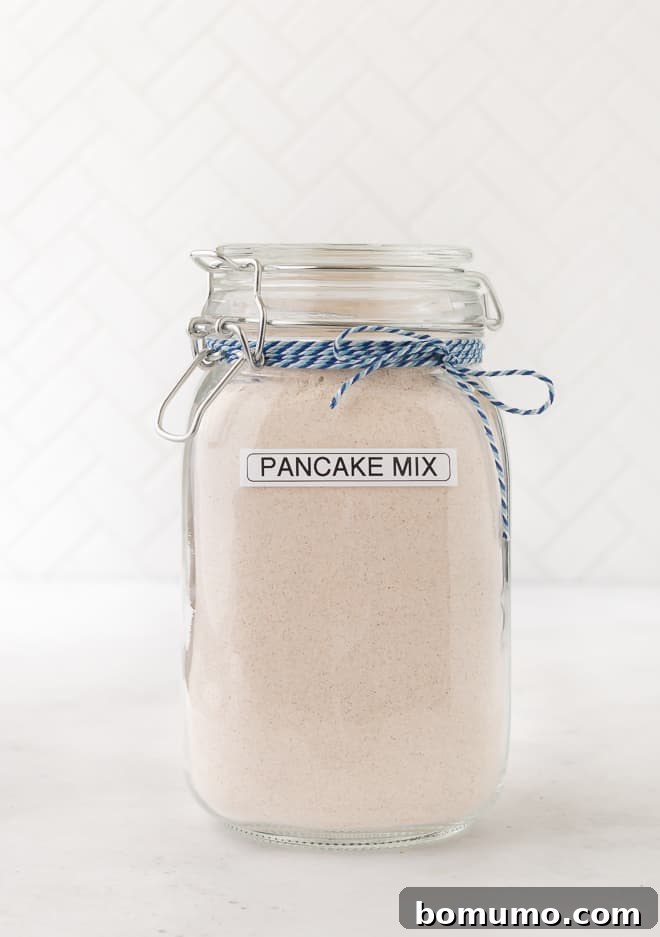 Image of whole wheat pancake mix in a large jar, ready for storage.