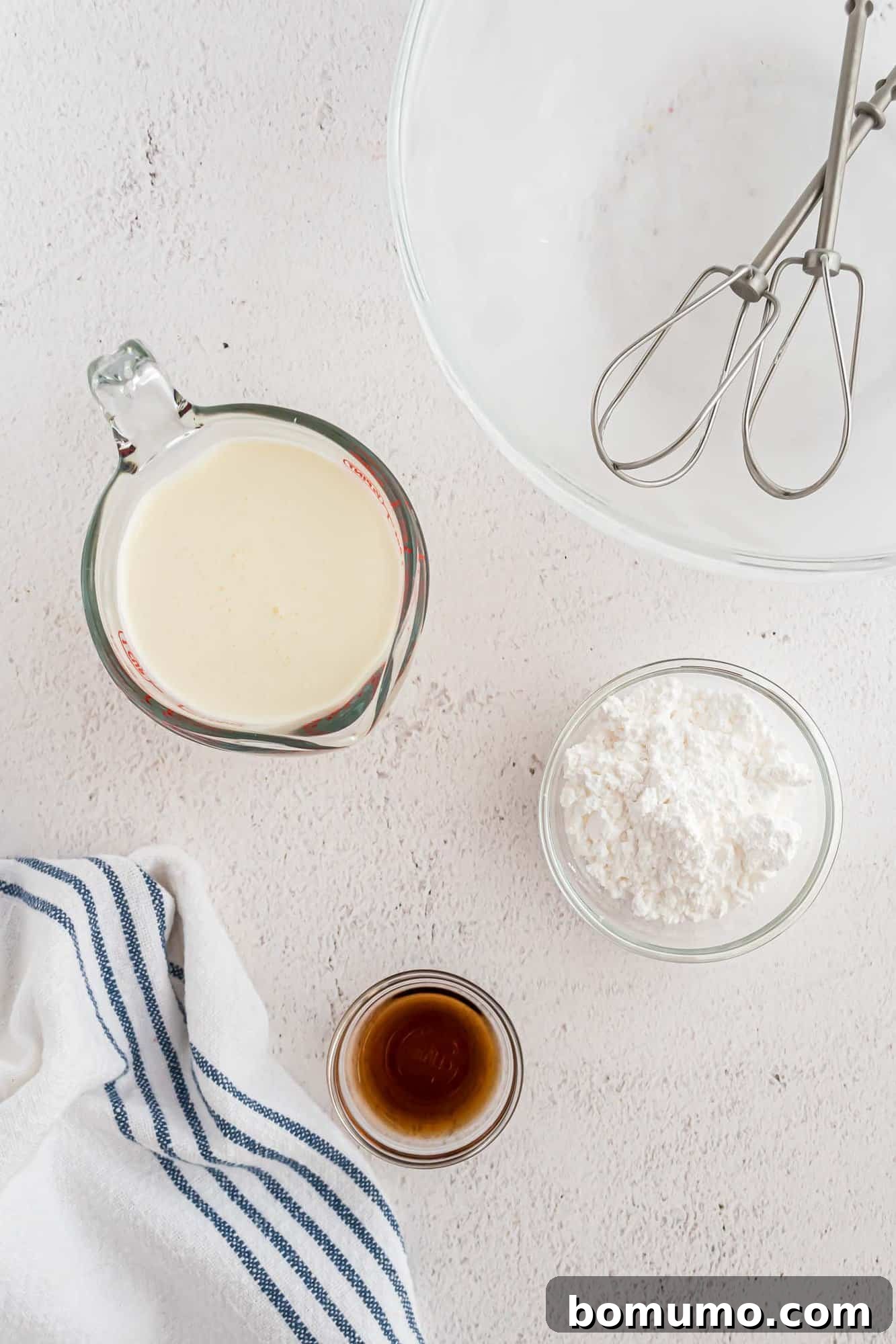Ingredients needed for whipped cream, neatly laid out.