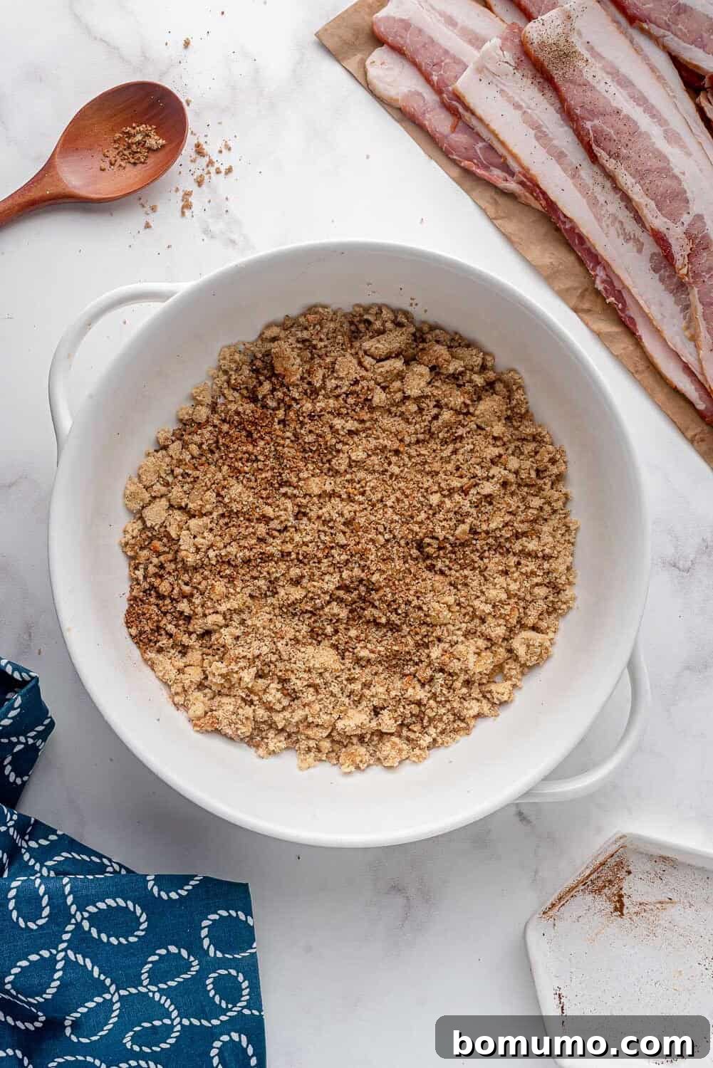 Close-up of the perfectly blended brown sugar and spice mixture, ready for coating bacon.