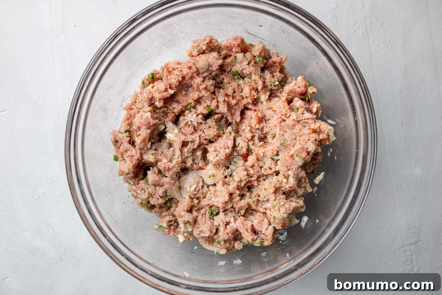 Meatball mixture not yet formed.