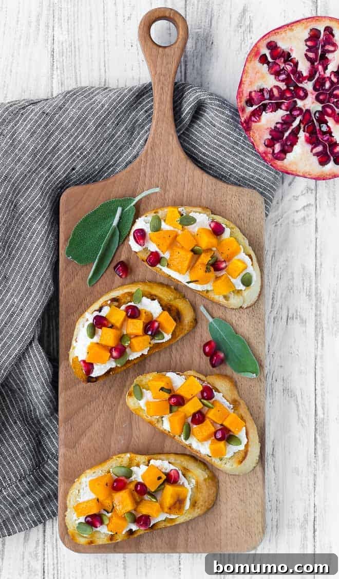 Photo of four squash crostini arranged on a wooden platter.