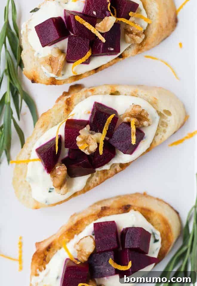 An inviting overhead photograph of vibrant beet and goat cheese crostini, beautifully arranged and ready to be enjoyed.