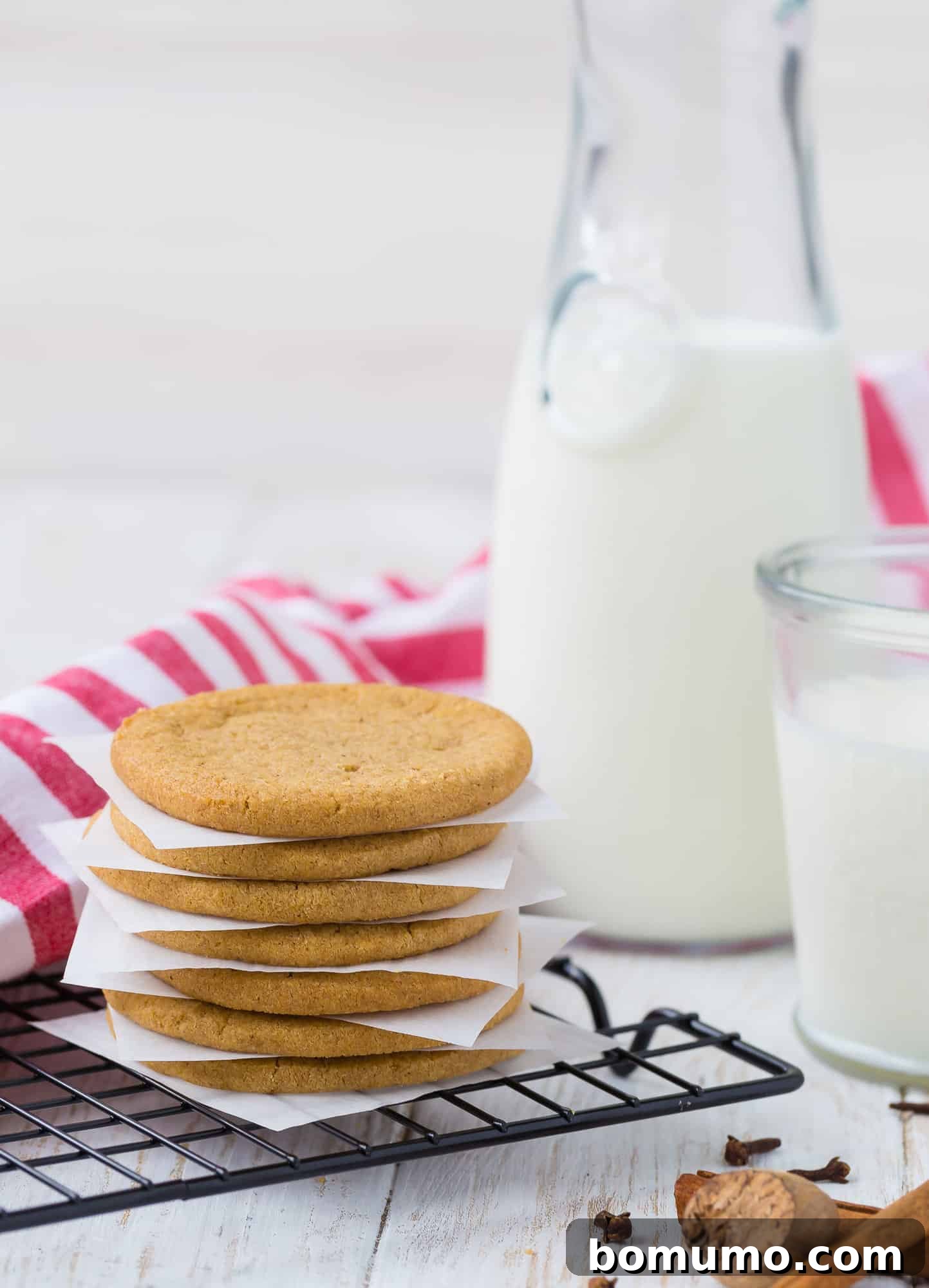 Freshly baked Windmill Cookies cooling on a wire rack, showcasing their even golden-brown bake and inviting texture, ready to be stored or served.