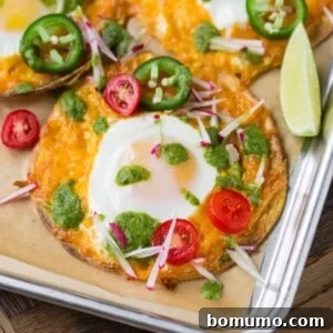 Sheet pan breakfast tostada with tomatoes, jalapeno, radish.
