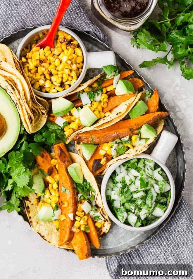 A vibrant, close-up image of a single vegetarian sweet potato taco, beautifully garnished with fresh cilantro, crisp onions, and a delicate drizzle of sauce, showcasing its appealing textures and colors.