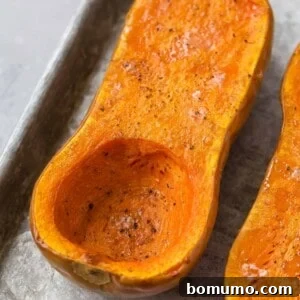 Roasted butternut squash half.
