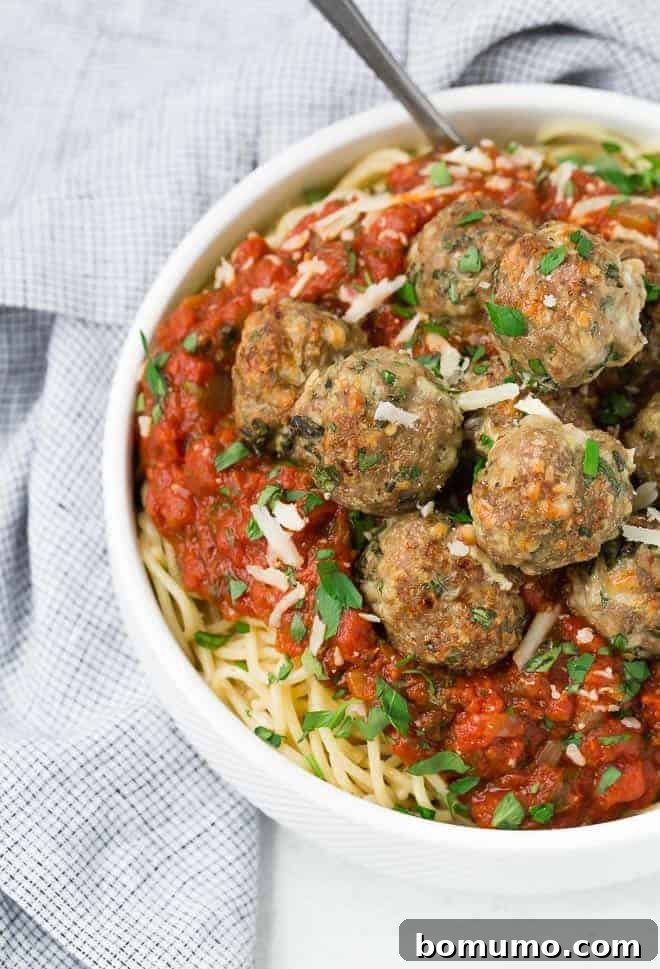 Image of meatballs in a bowl with spaghetti and sauce.