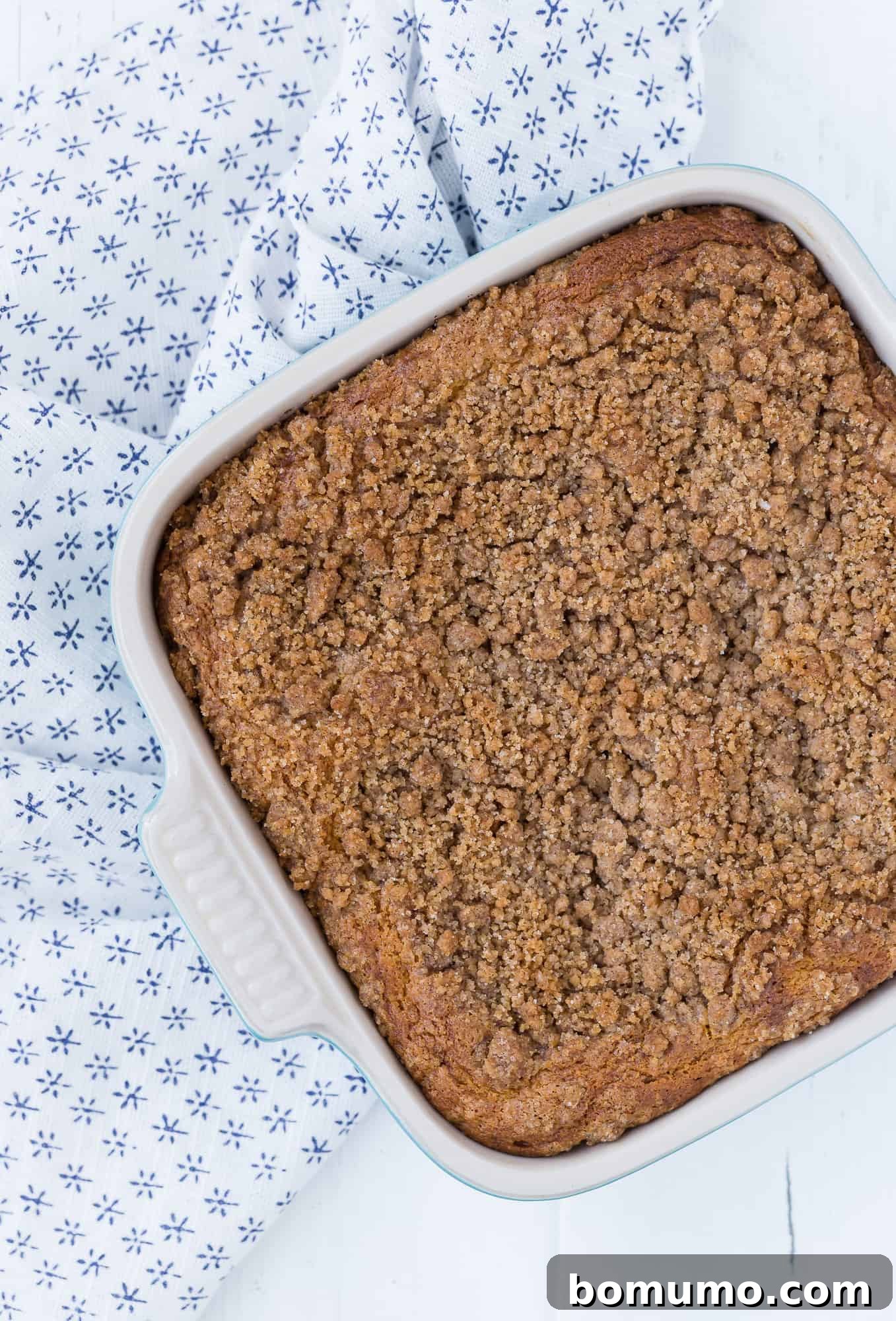 Overhead view of cake in a pan.