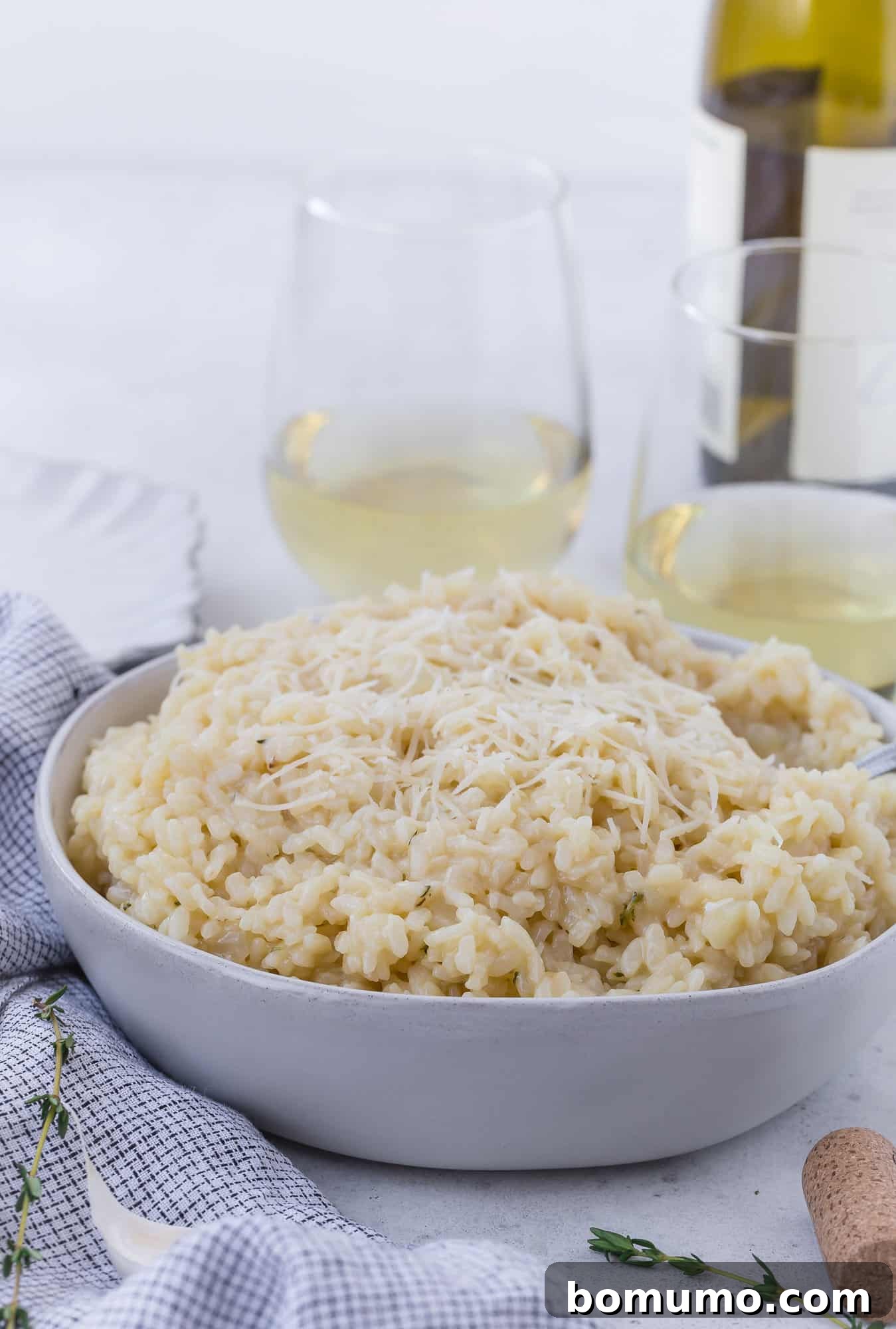 Instant Pot Risotto with cheese melted on top.