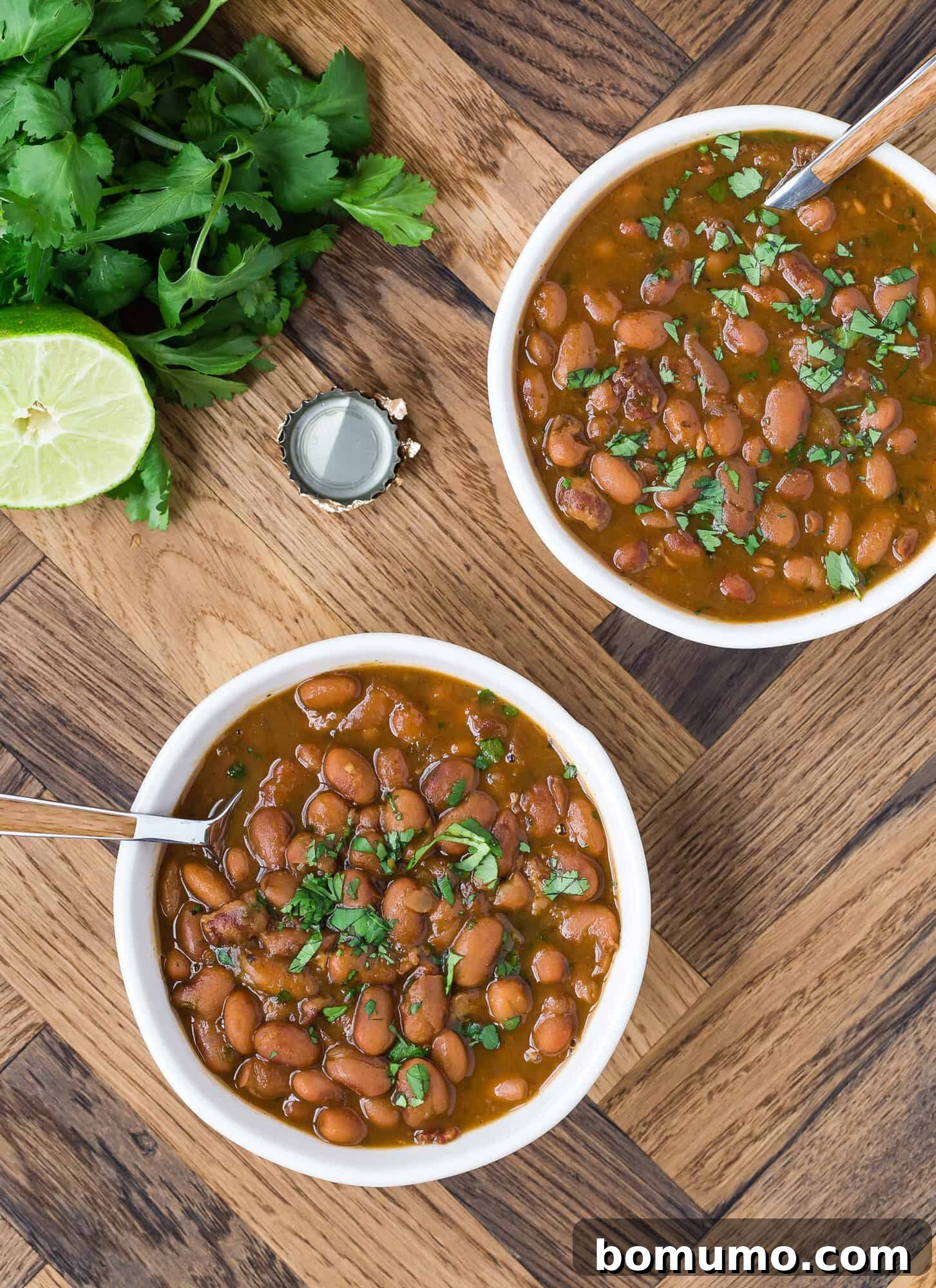 Drunken beans, beer cap, cilantro, half of a lime.