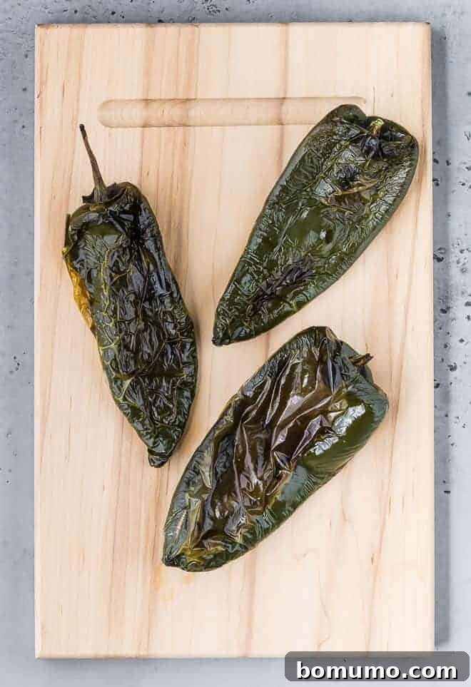 Poblano Perfection: 4 Roasting Methods 3 Image of roasted poblano peppers that haven't been peeled.