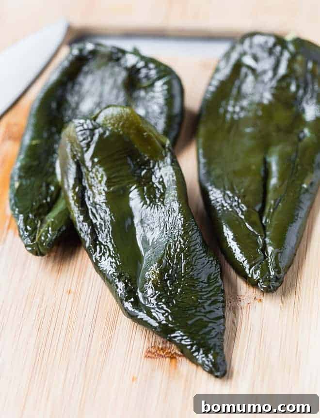 Poblano Perfection: 4 Roasting Methods 5 Roasted poblano peppers that have been peeled.