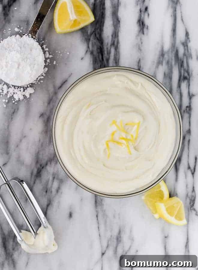 Overhead image of cream cheese frosting flavored with fresh lemon. 