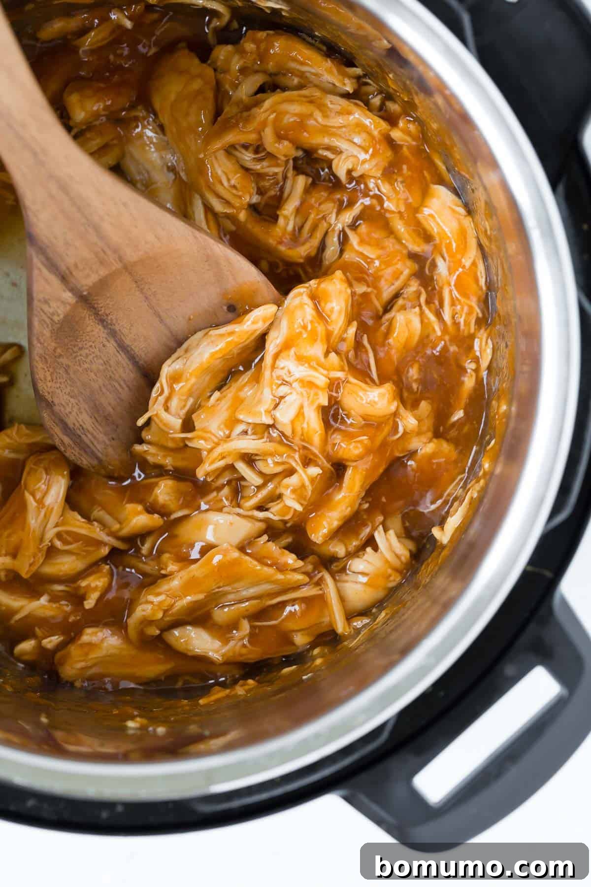 Overhead view of honey sriracha chicken in an instant pot.
