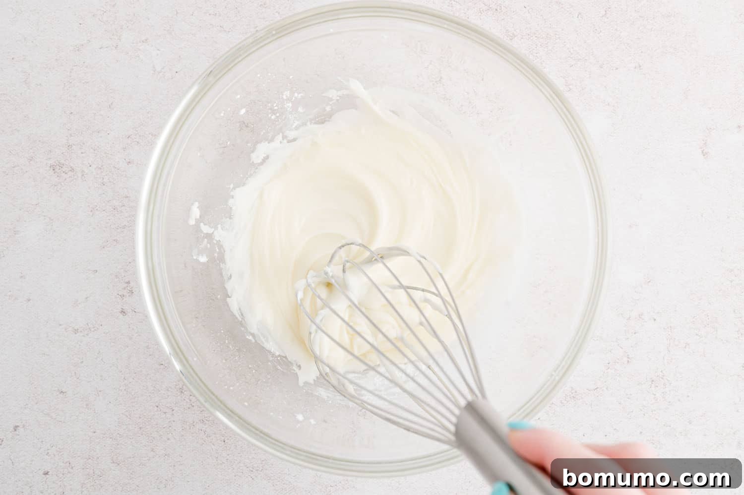 Icing being mixed.