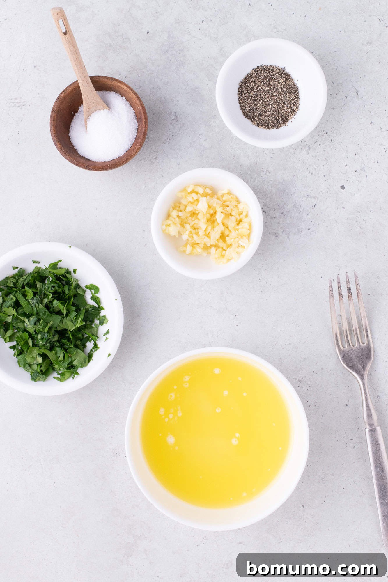 Overhead view of garlic butter ingredients.