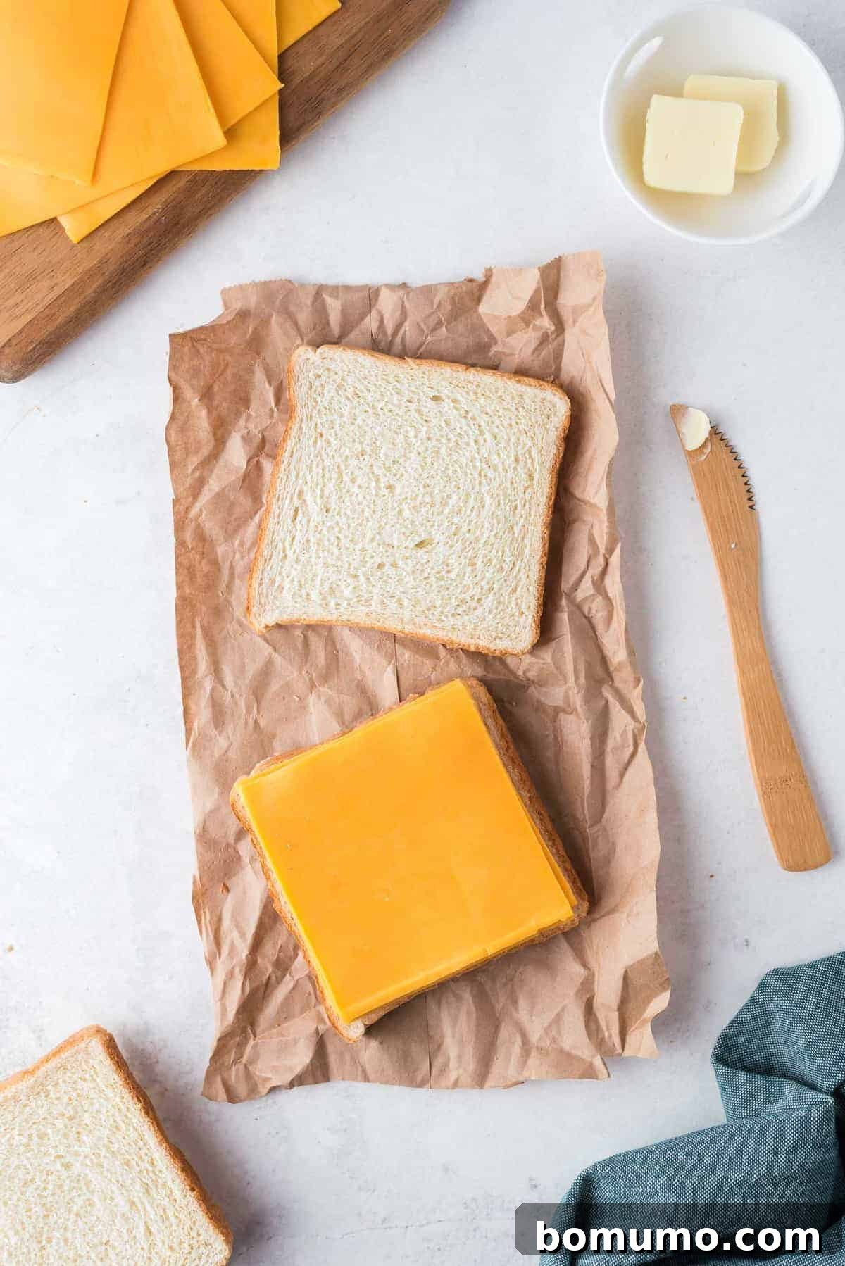 A grilled cheese sandwich being prepared.