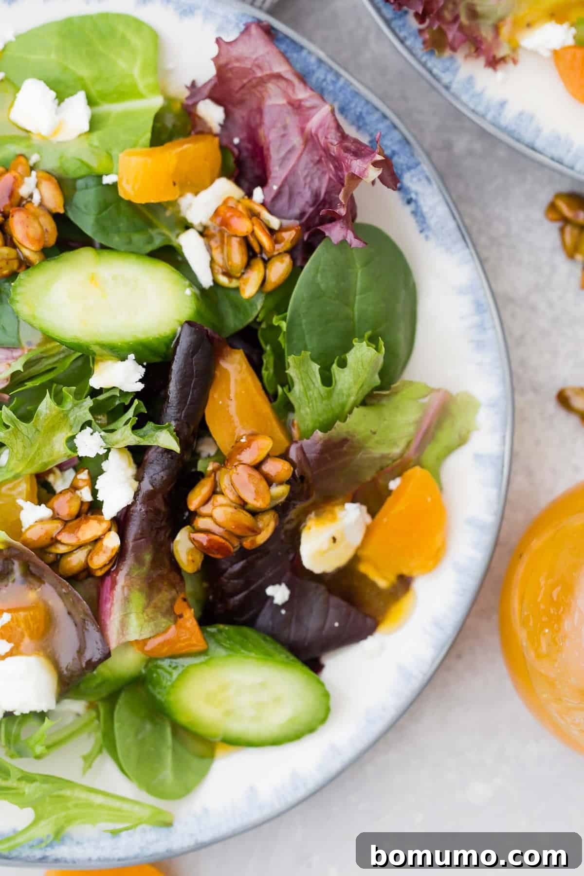 salad with dried apricots, cucumbers, pepitas.