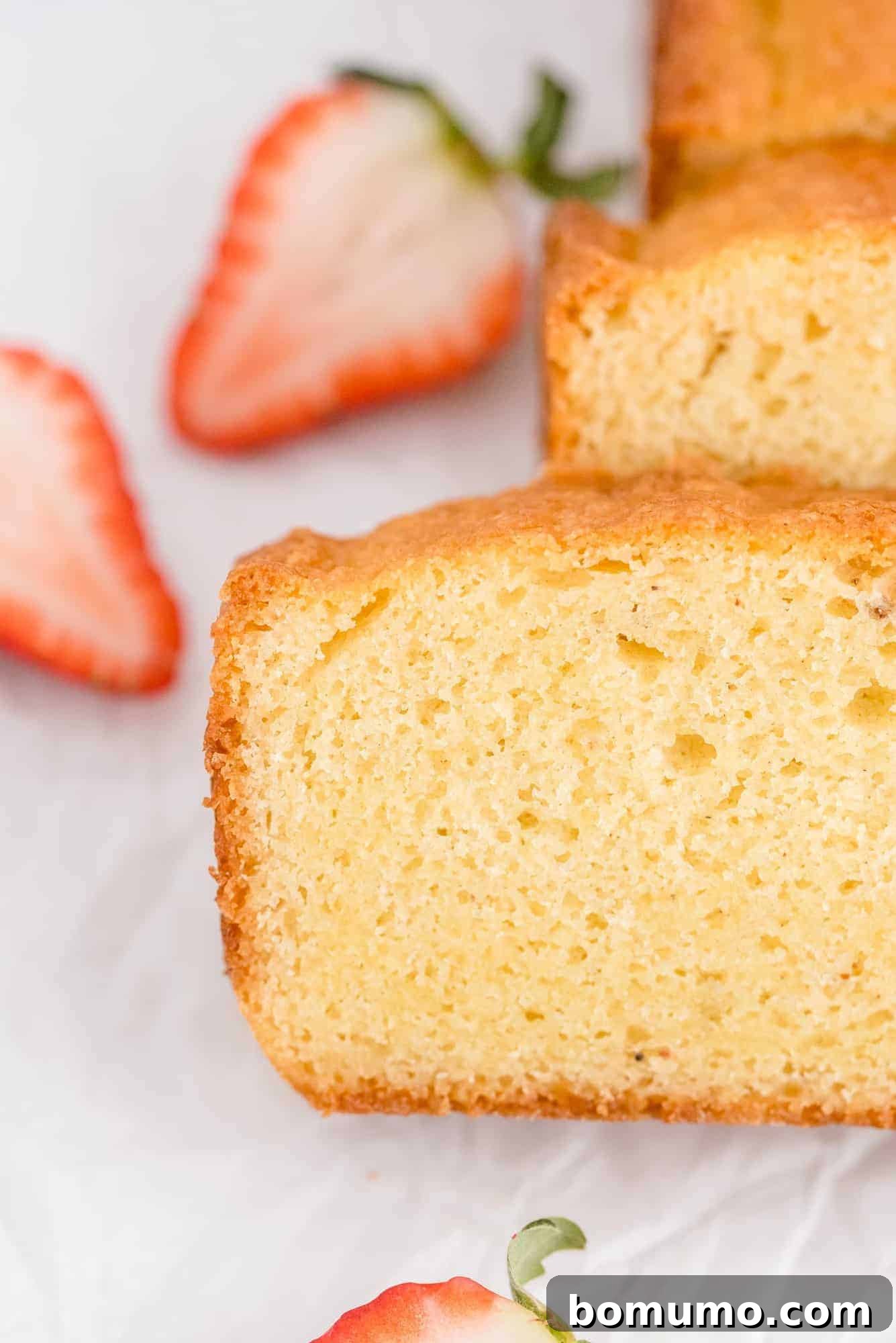 Timeless Pound Cake Perfection 11 Beautifully sliced pound cake loaves presented in a rustic, inviting manner, ready to be enjoyed.