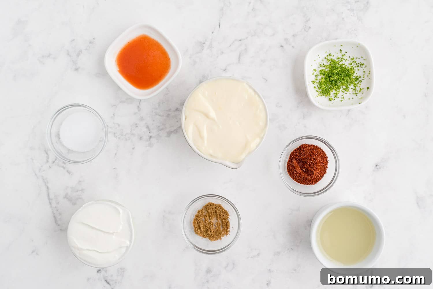 A visual guide showing the individual ingredients needed for the salad dressing before mixing, followed by the perfectly combined creamy dressing.
