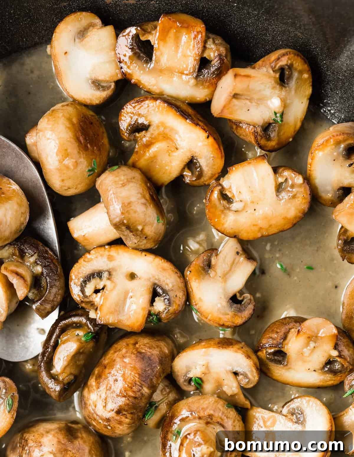 Close up of sautéed mushrooms.