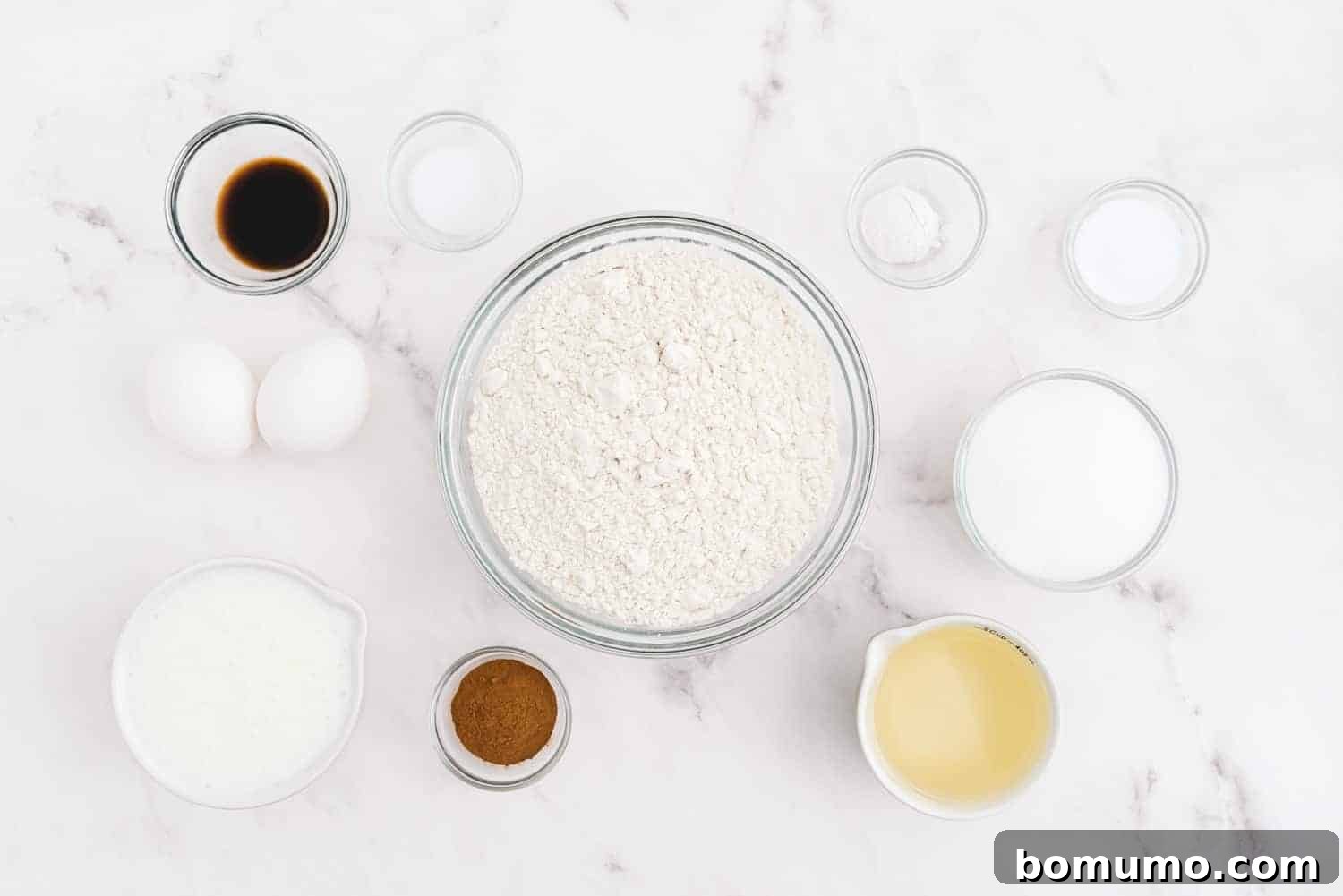 Overhead shot of all ingredients neatly arranged, ready to be used for the Snickerdoodle Bread recipe.