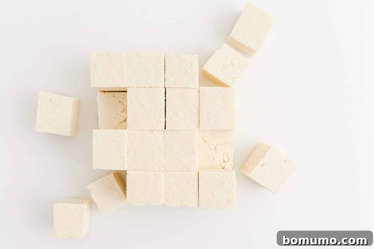 Cubed uncooked tofu.