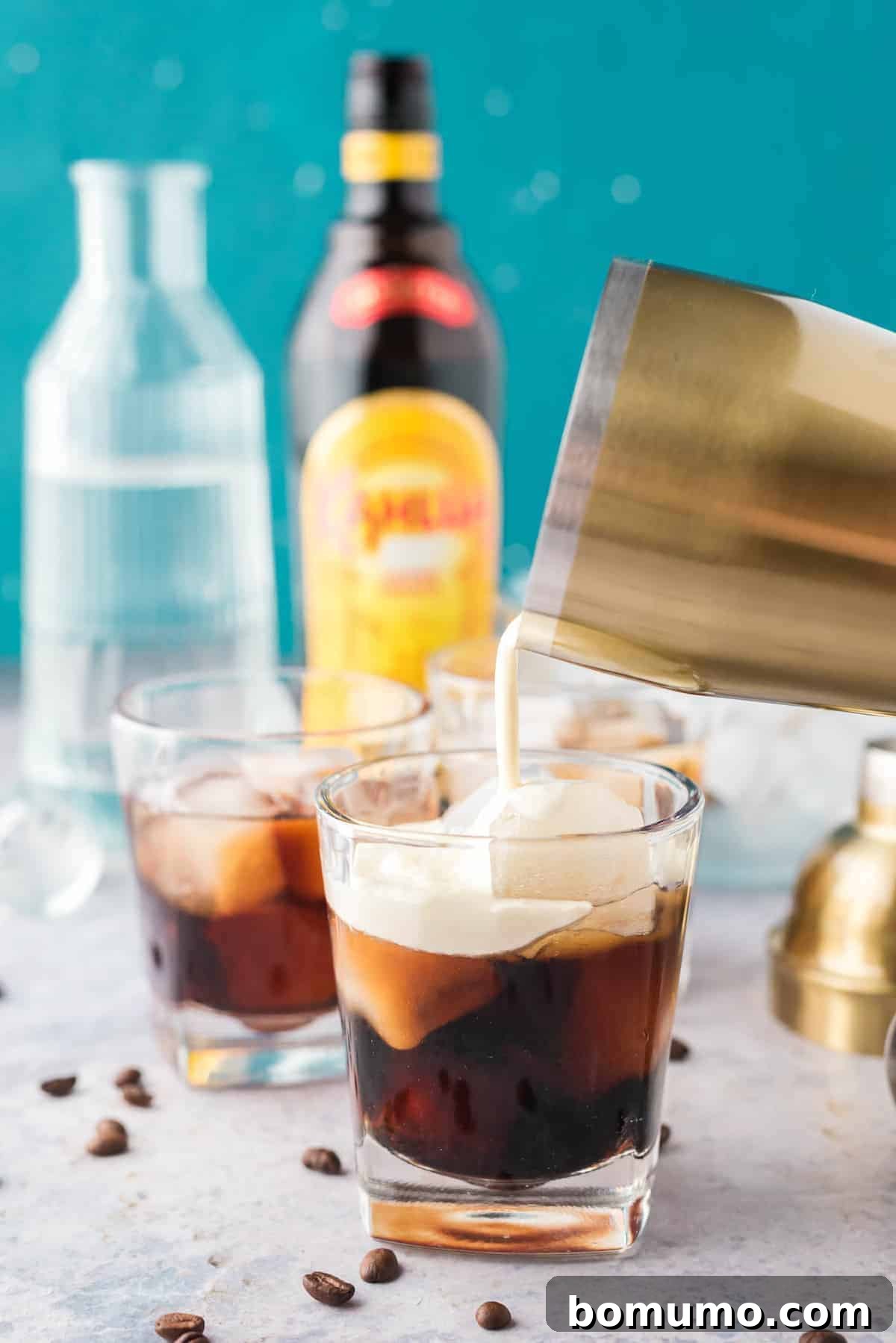 White russian drink being made.