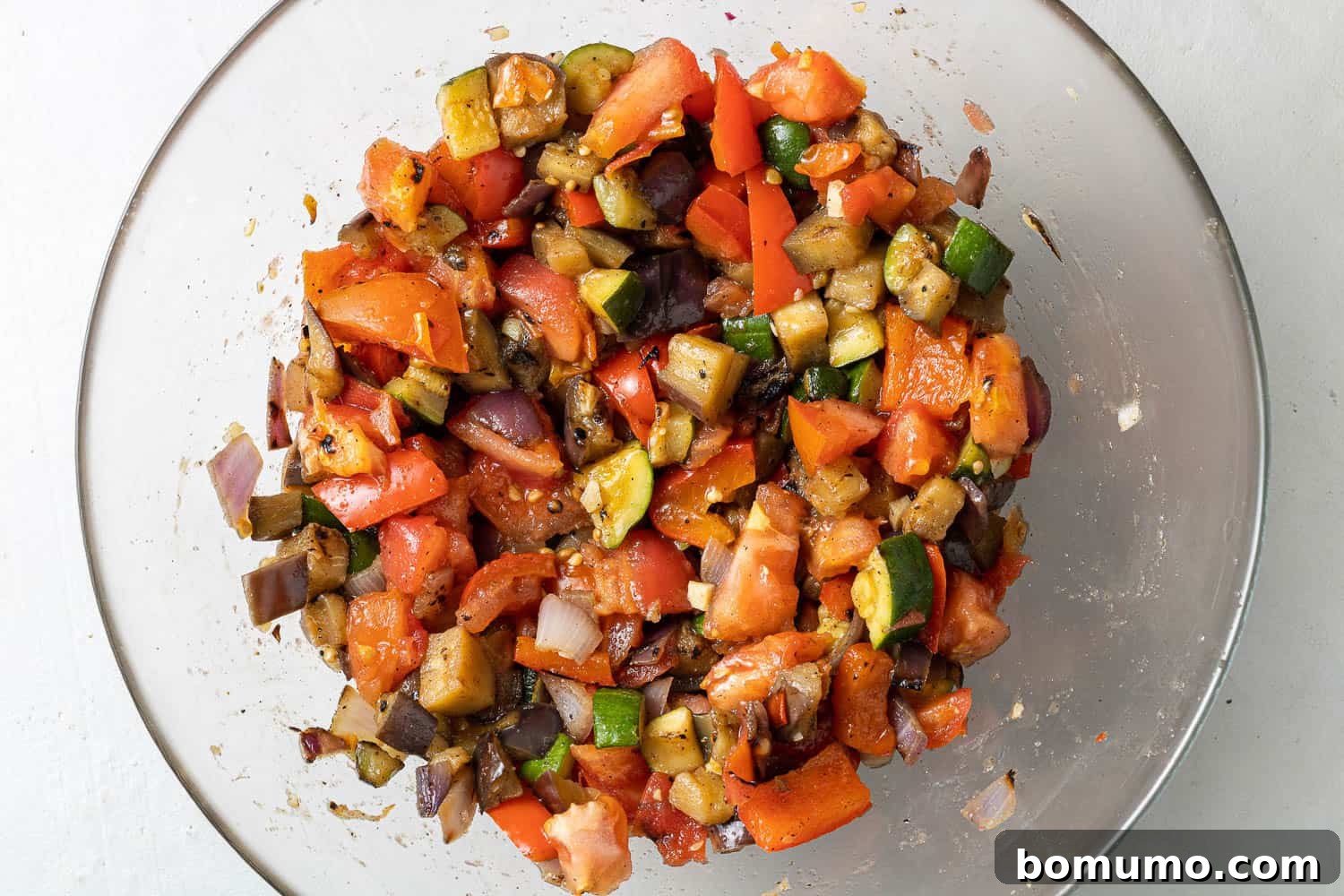 Cooked vegetables in a glass bowl.