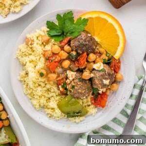 Plate of couscous and moroccan meatballs with chickpeas.