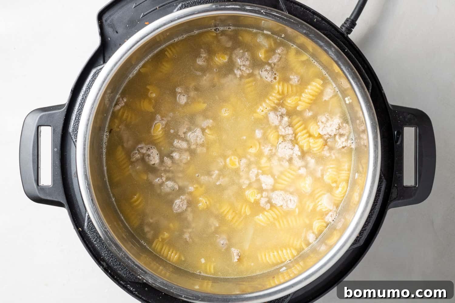 Uncooked pasta in an instant pot.