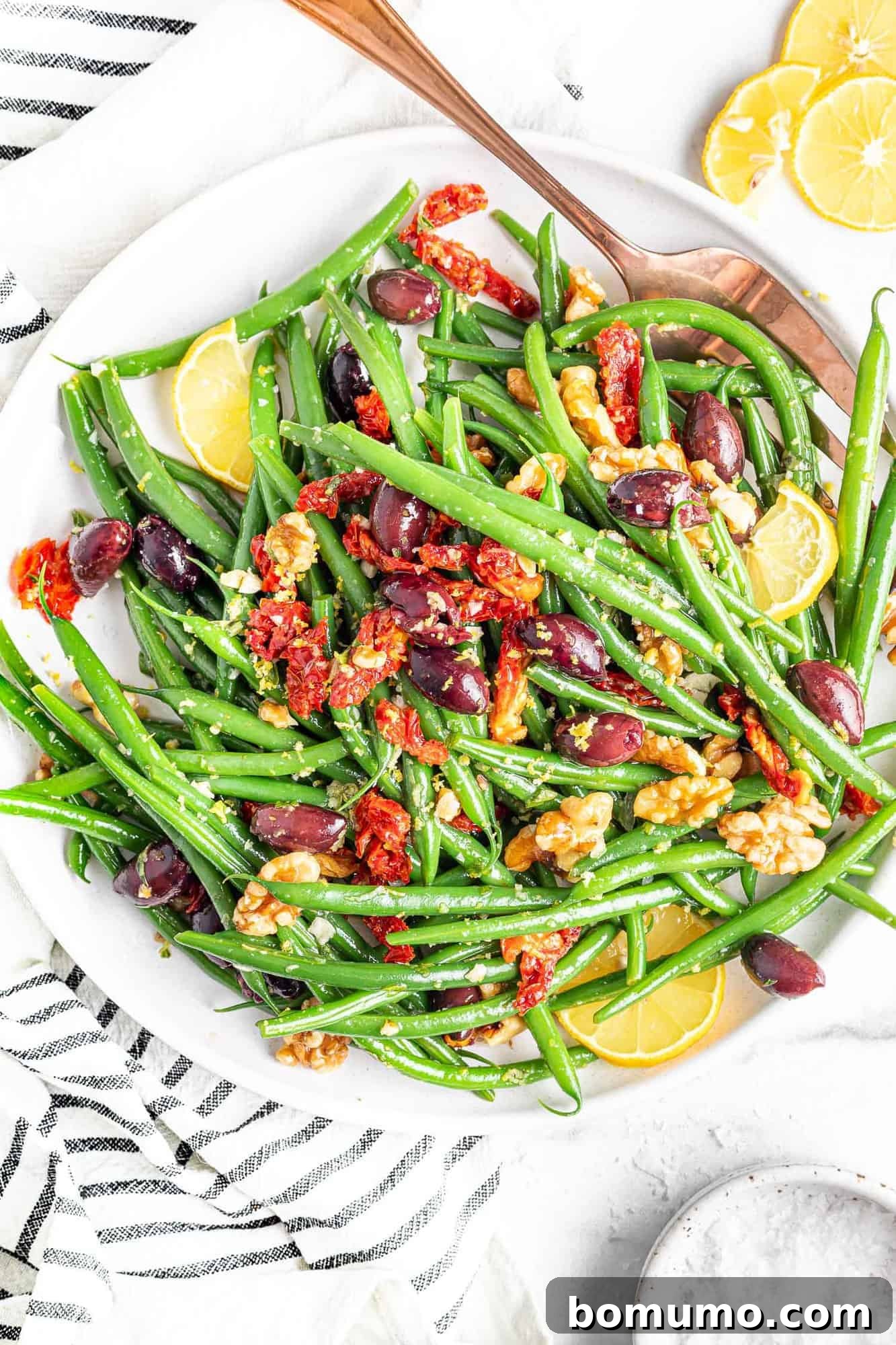 Green bean salad with kalamata olives, walnuts, and sun dried tomatoes.