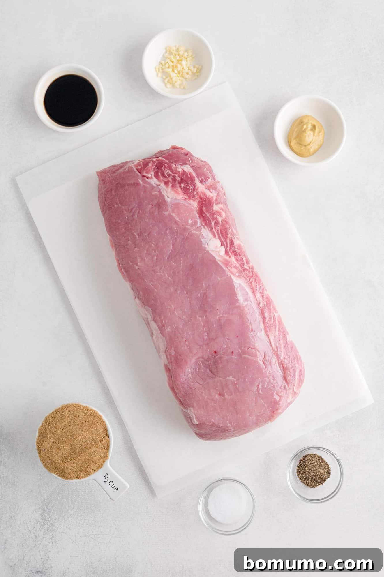 Ingredients for slow cooker pork loin with balsamic glaze laid out.