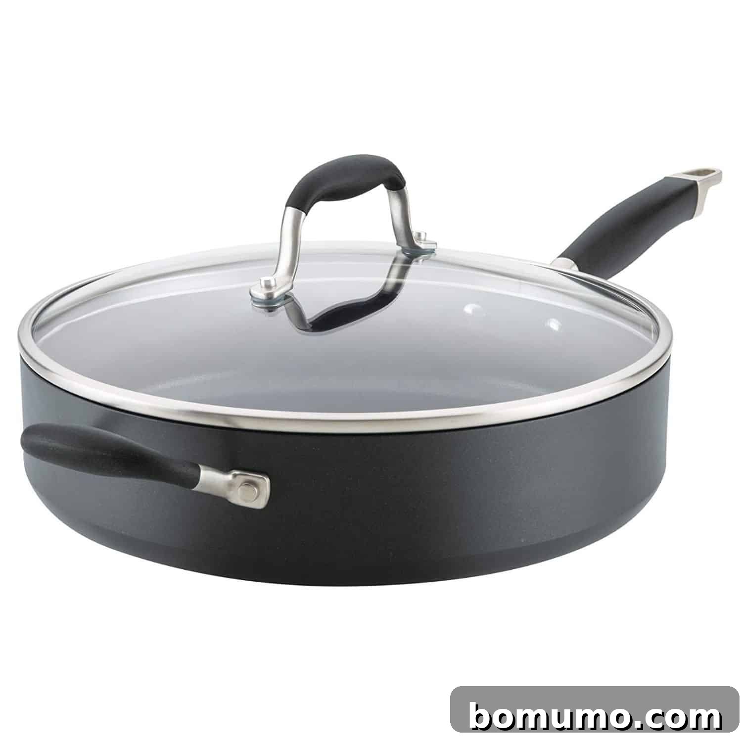 Covered skillet on white background.