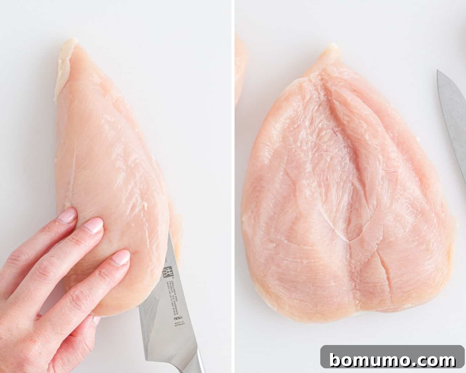 A chicken breast being butterflied open with a sharp knife.