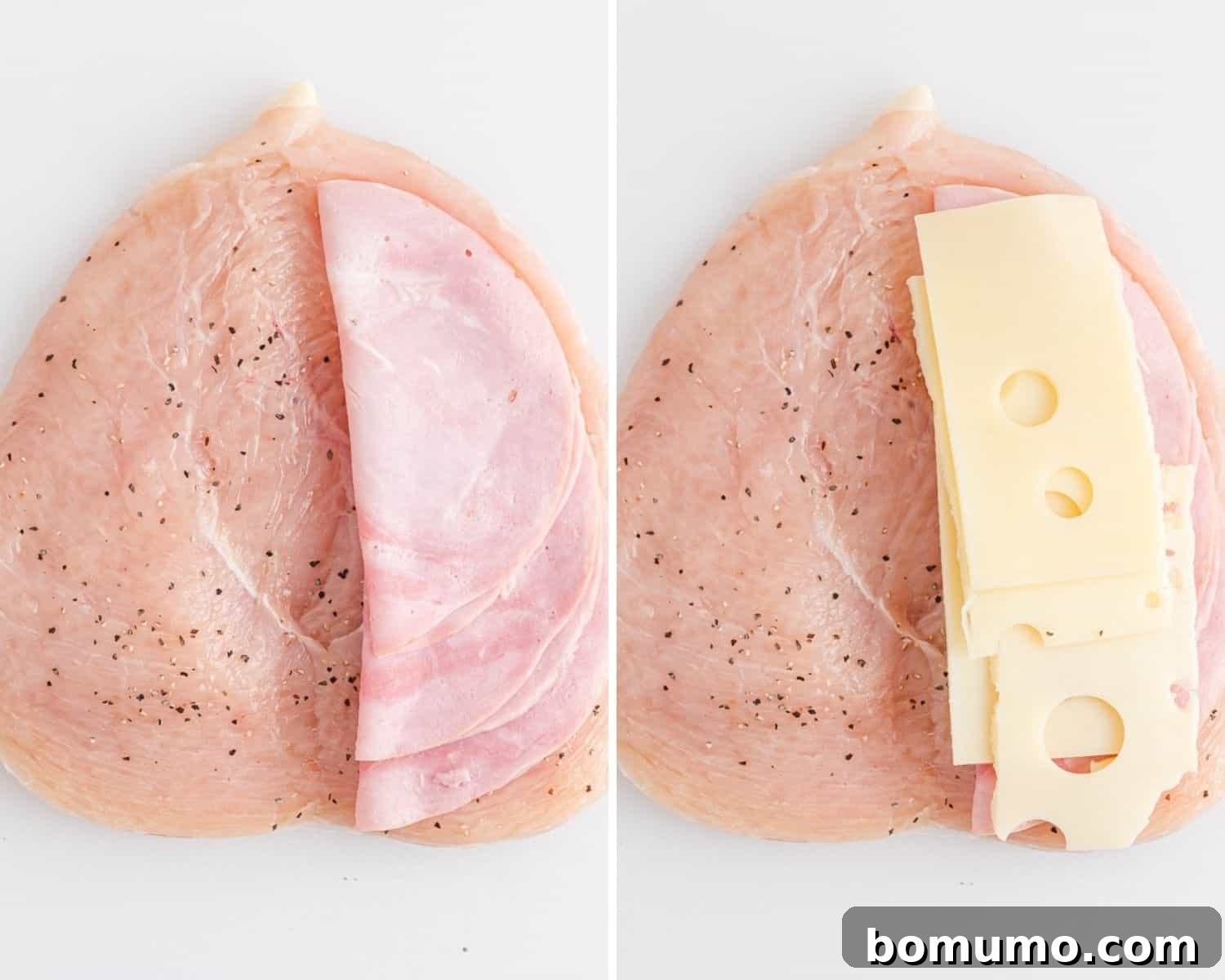Flattened chicken breast with slices of ham and Swiss cheese neatly arranged on one half.