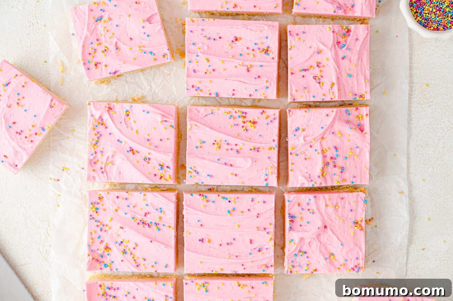 Sugar cookie bars perfectly cut into neat squares, ready for serving.