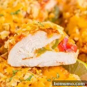 Chicken breast stuffed with fajita vegetables and cheese, topped with a crispy coating.