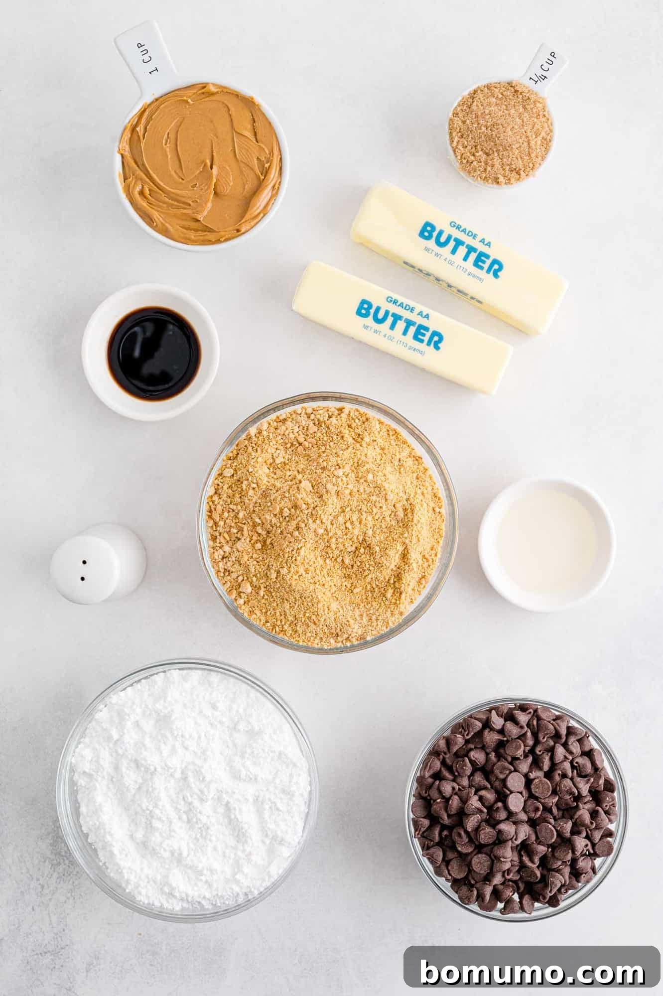 Overhead view of all ingredients neatly laid out for making no-bake peanut butter bars.