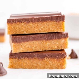 Stack of three peanut butter and chocolate bars.