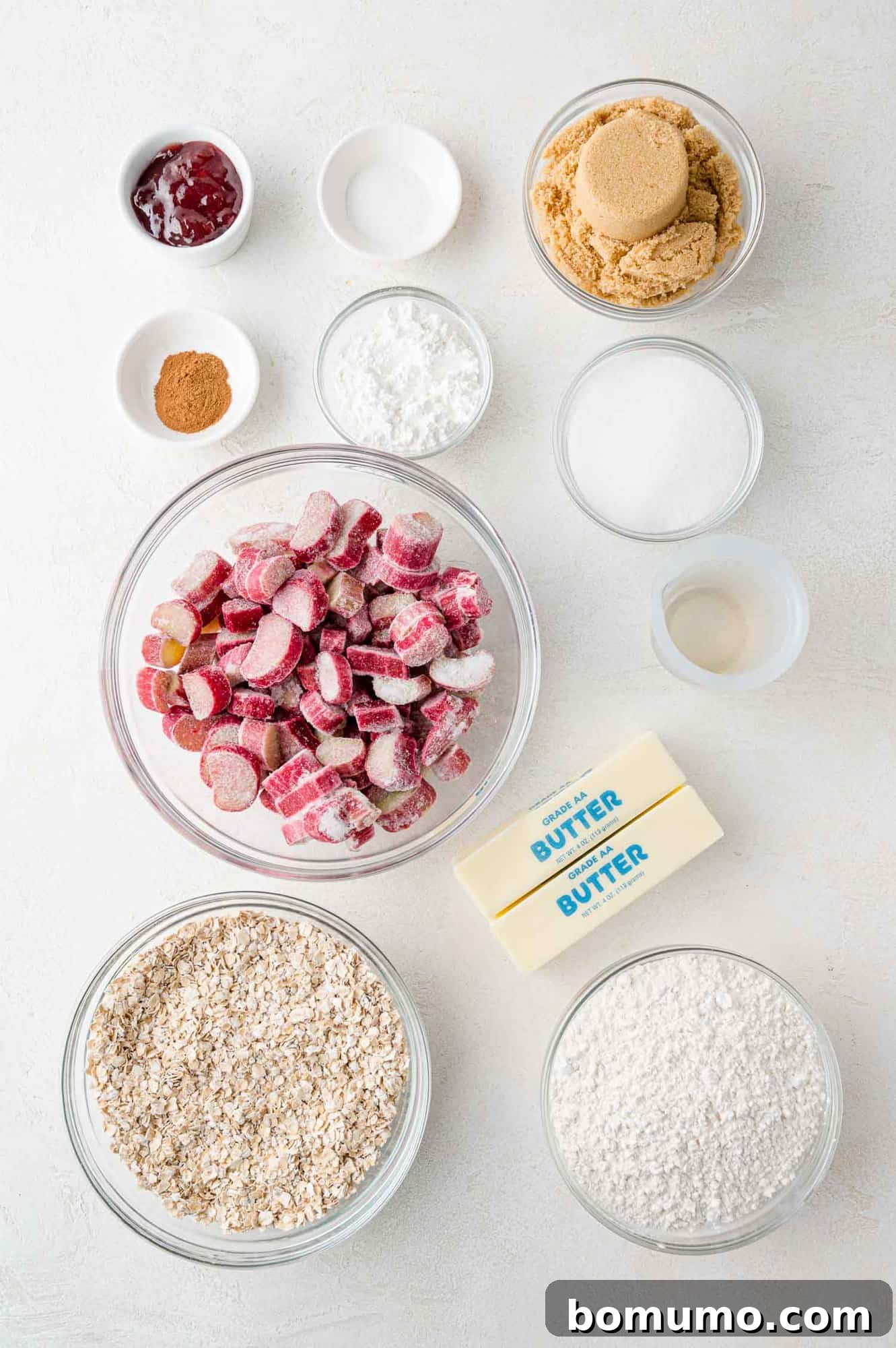Overhead view of all the fresh ingredients perfectly laid out for making rhubarb bars.